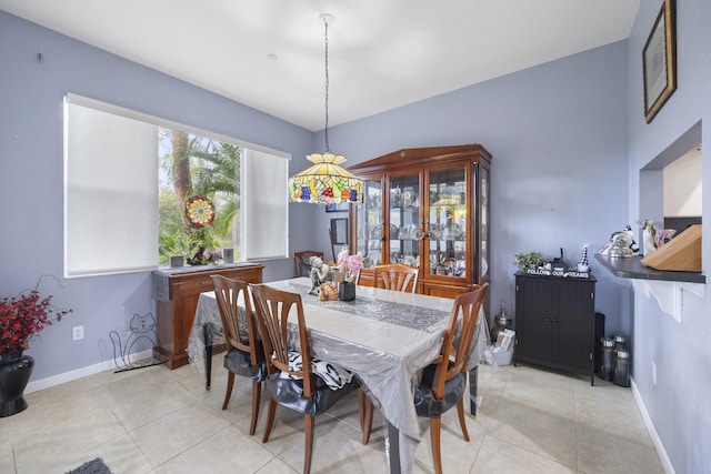 dining space with light tile patterned flooring