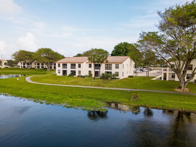 exterior space with a water view