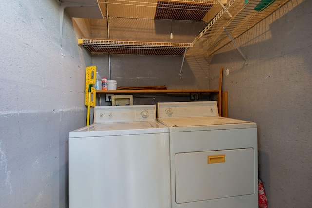 washroom featuring washer and dryer