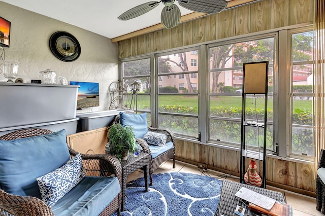 sunroom / solarium with ceiling fan