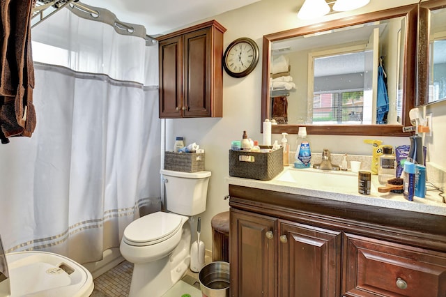 full bathroom featuring vanity, toilet, shower / bathtub combination with curtain, and tile patterned flooring