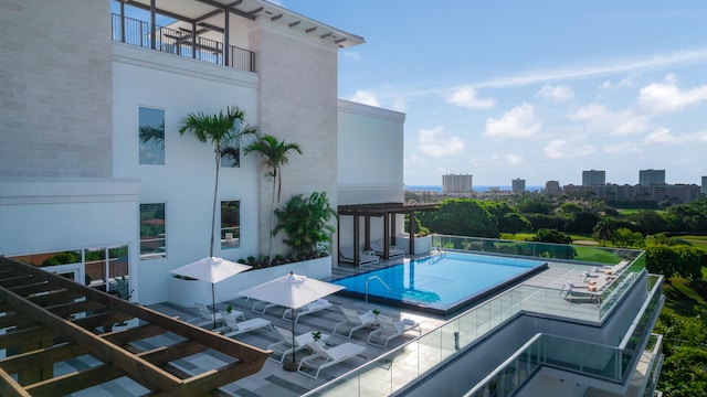 view of pool featuring a patio