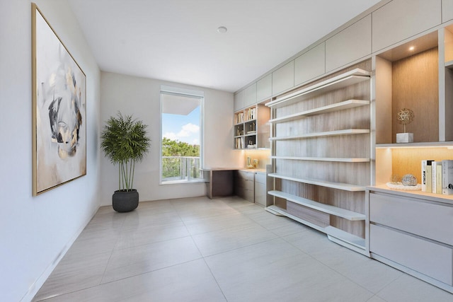 home office featuring light tile patterned floors