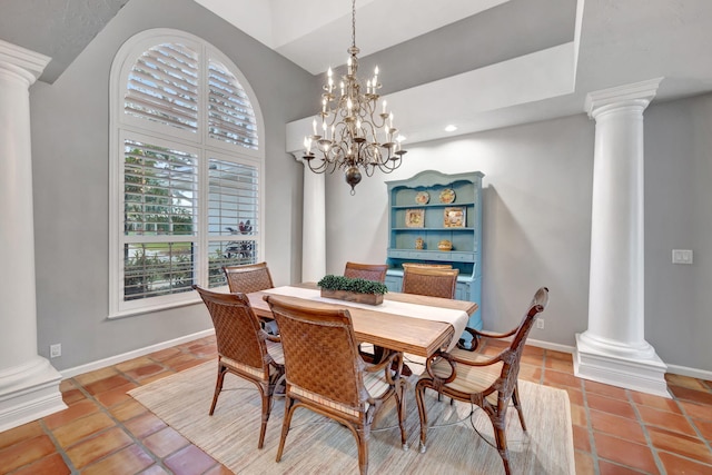 tiled dining space with an inviting chandelier