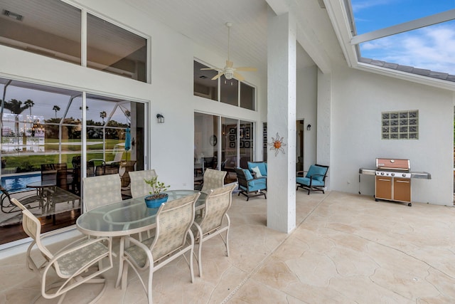 view of patio / terrace featuring a grill and ceiling fan