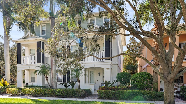 view of front of home with a balcony