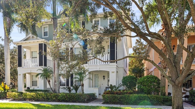 view of front of property with a balcony