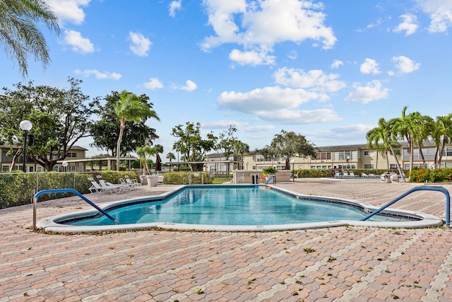 view of pool with a patio area