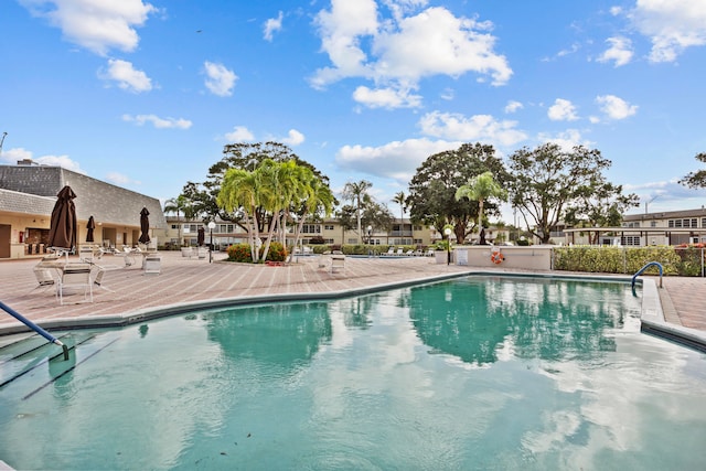 view of pool featuring a patio area