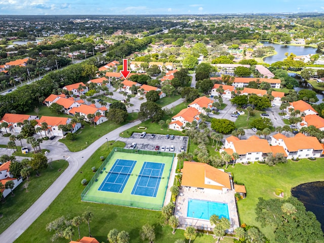 birds eye view of property featuring a water view