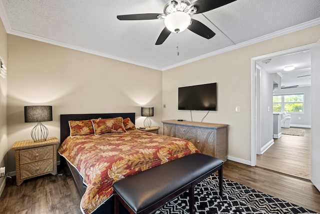 bedroom featuring hardwood / wood-style flooring, a textured ceiling, ceiling fan, and crown molding