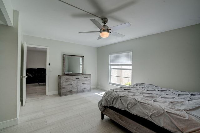 bedroom featuring ceiling fan and light wood-type flooring