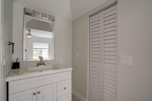 bathroom featuring ceiling fan and vanity