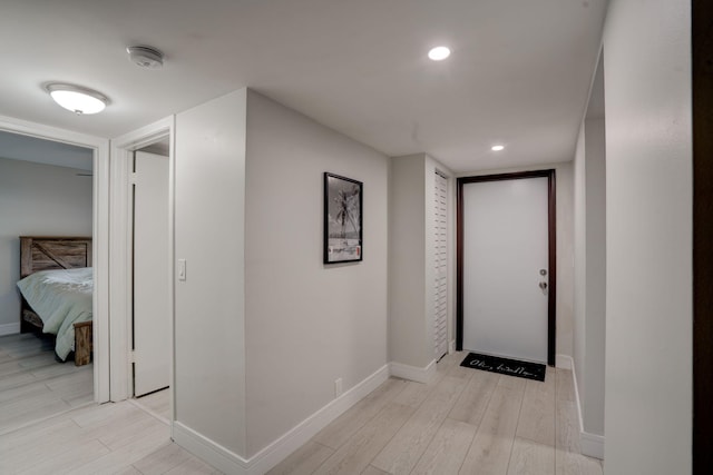 hallway featuring light wood-type flooring