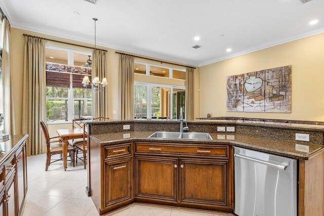 kitchen with crown molding, dishwasher, hanging light fixtures, and sink