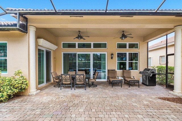 view of patio / terrace featuring area for grilling and ceiling fan