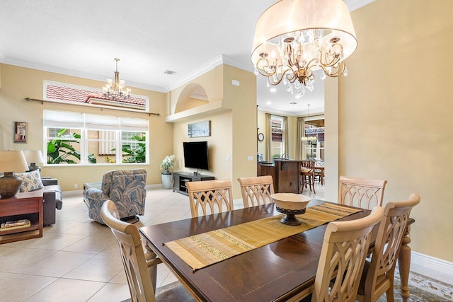 dining space with crown molding, light tile patterned floors, a chandelier, and a textured ceiling