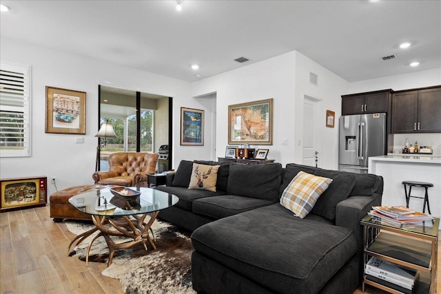 living room featuring light hardwood / wood-style flooring