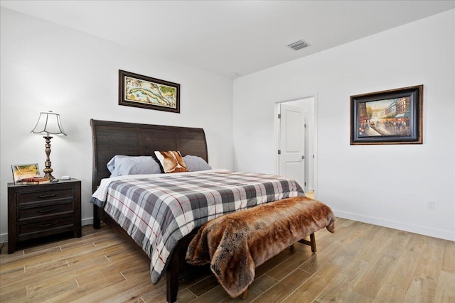 bedroom featuring light hardwood / wood-style floors