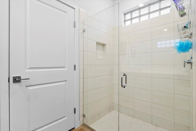 bathroom with an enclosed shower