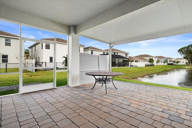 view of patio featuring a water view