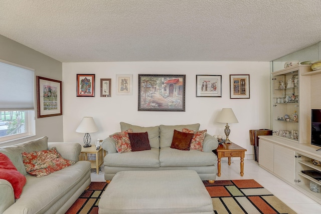 tiled living room with a textured ceiling