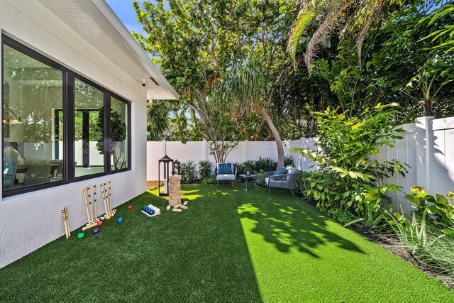 view of yard with a fenced backyard