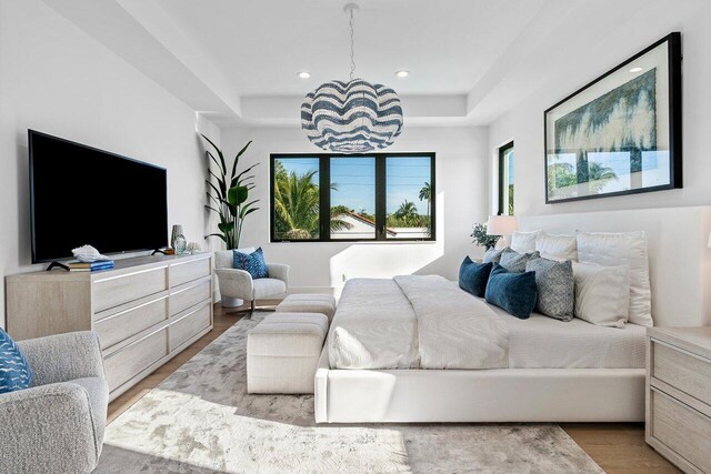 bedroom featuring baseboards, recessed lighting, light wood-style floors, and visible vents