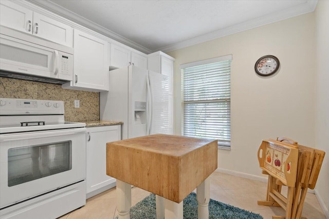 kitchen with backsplash, white cabinetry, white appliances, and light tile patterned floors