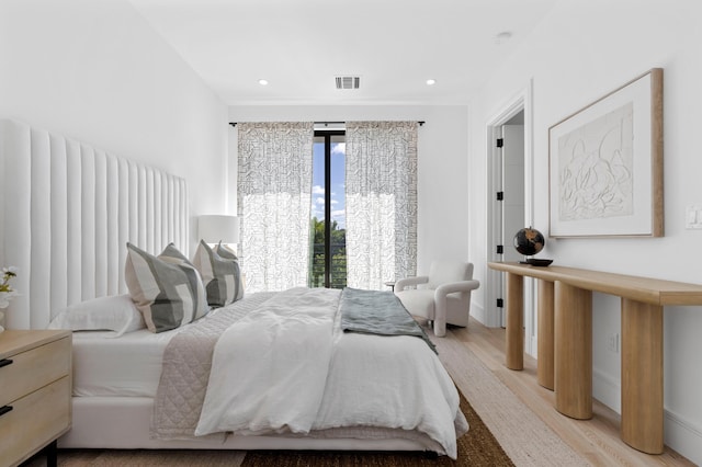 bedroom featuring light hardwood / wood-style floors