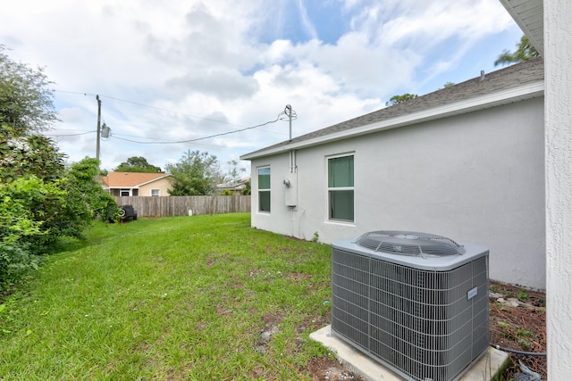 view of yard featuring central AC