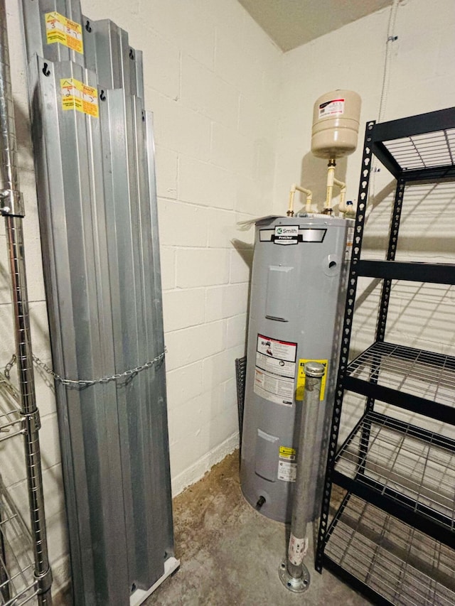 utility room with water heater