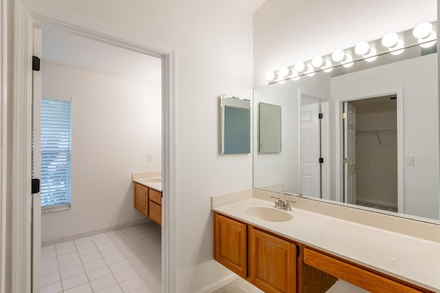 bathroom featuring toilet, an enclosed shower, and tile patterned floors