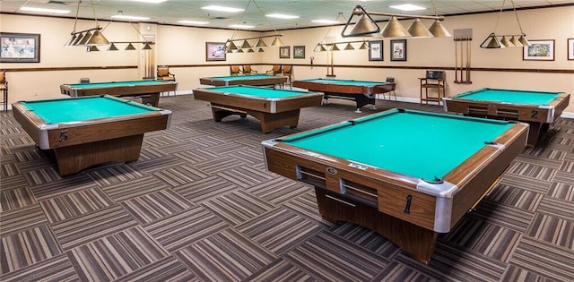 recreation room with dark colored carpet