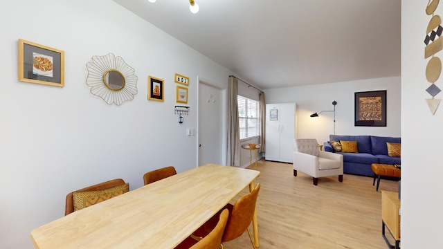 dining area with light wood-type flooring