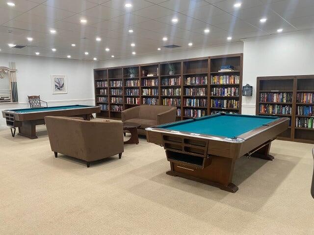 recreation room featuring pool table and light colored carpet