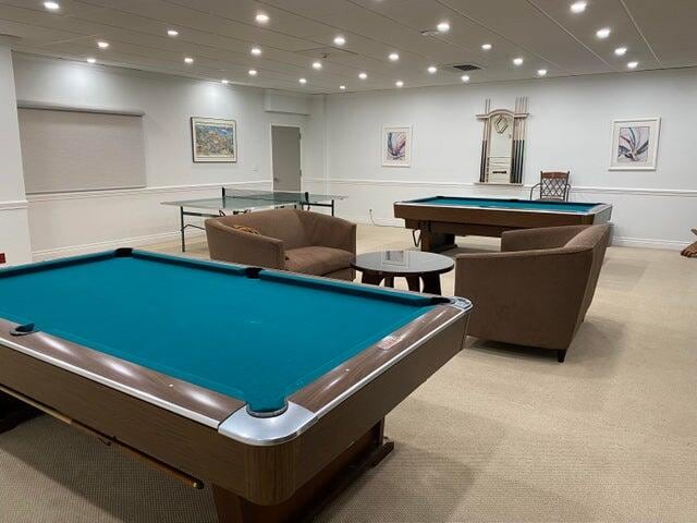 game room featuring light carpet and billiards