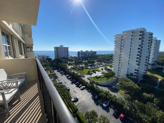 balcony featuring a water view