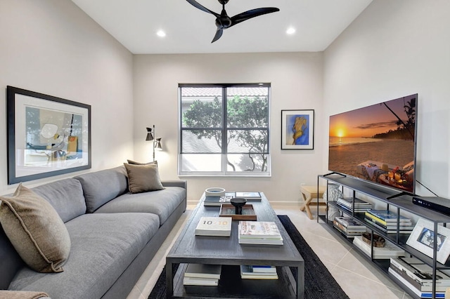 living room featuring ceiling fan and light tile patterned floors