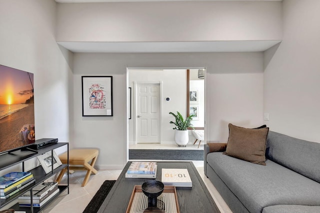 living room with light tile patterned flooring