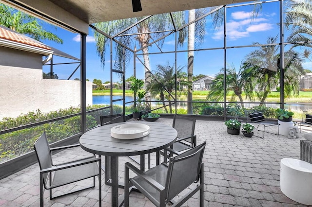 sunroom with a water view