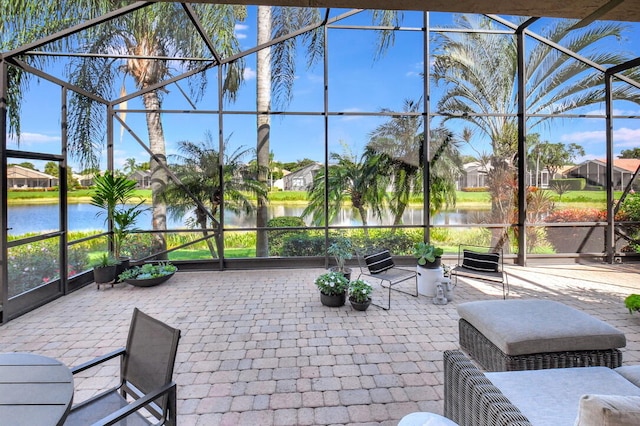 sunroom with a water view