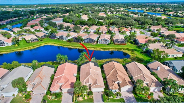 drone / aerial view with a water view