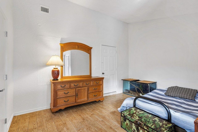 bedroom featuring light wood-type flooring