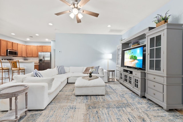 living room with ceiling fan