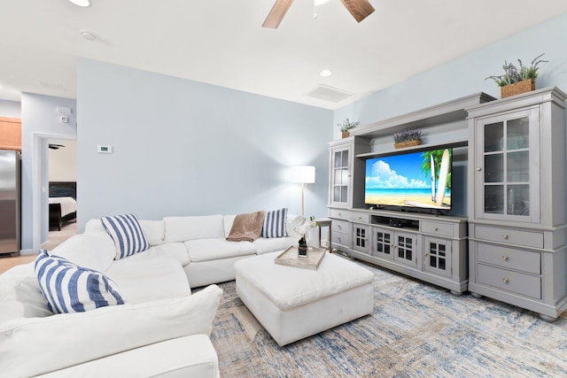 living room with ceiling fan