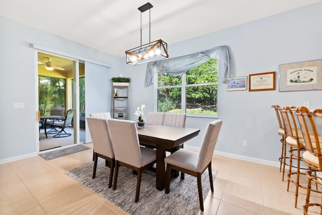 dining room featuring ceiling fan and light tile patterned floors