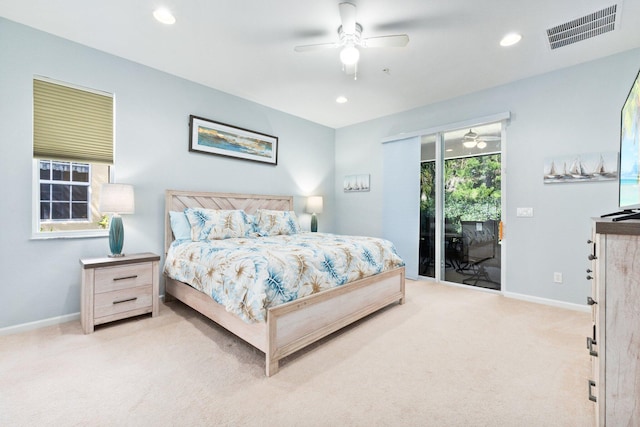 carpeted bedroom featuring ceiling fan and access to outside