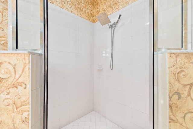 bathroom with a shower with shower door