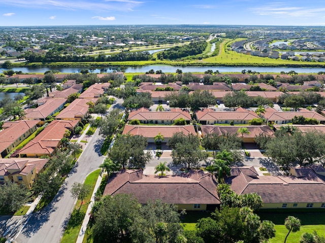 bird's eye view with a water view